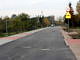 Ulica "bez nazwy" w Woli Krzysztoporskiej - nowy asfalt z chodnikiem i wjazdami do posesji