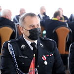 Uczestnicy zjazdu powiatowego OSP w mundurach przy stołach